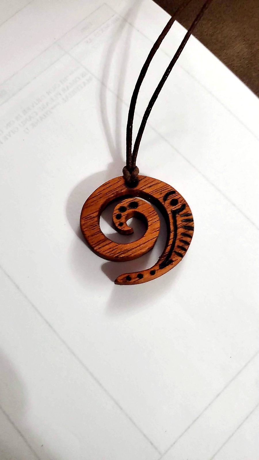 Carved pendant