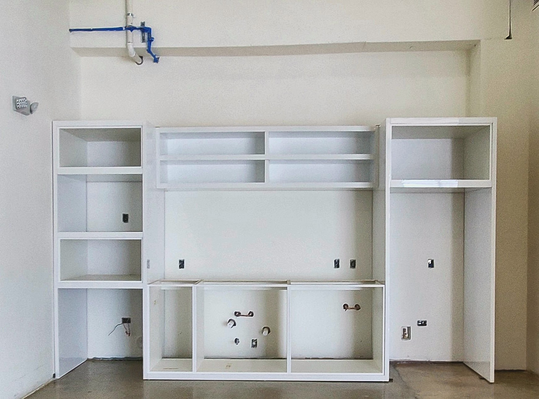 Cabinet boxes installed, no doors