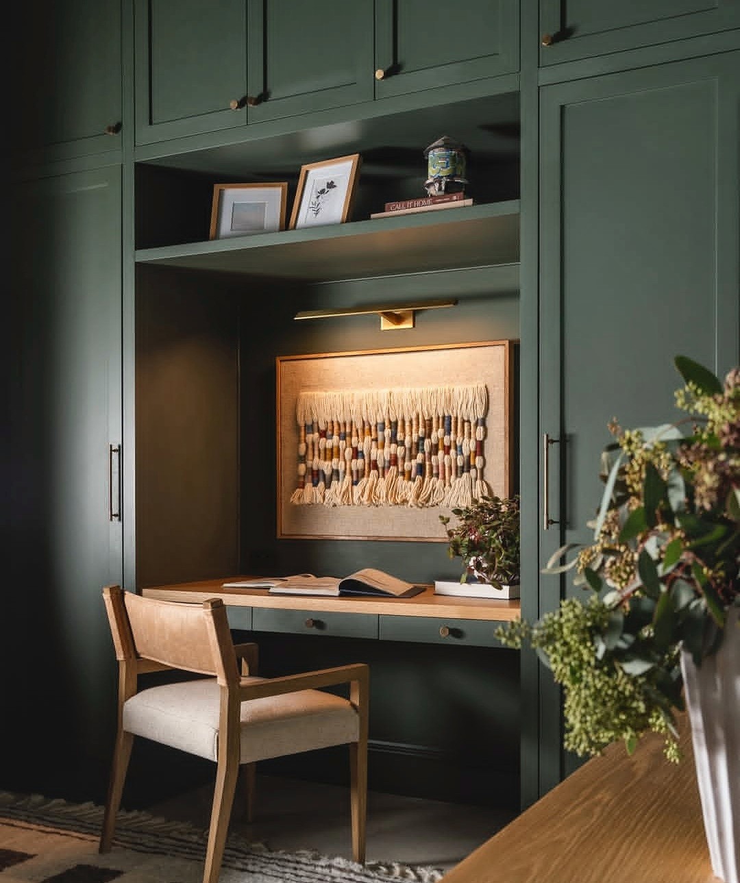Green study built-ins with desk
