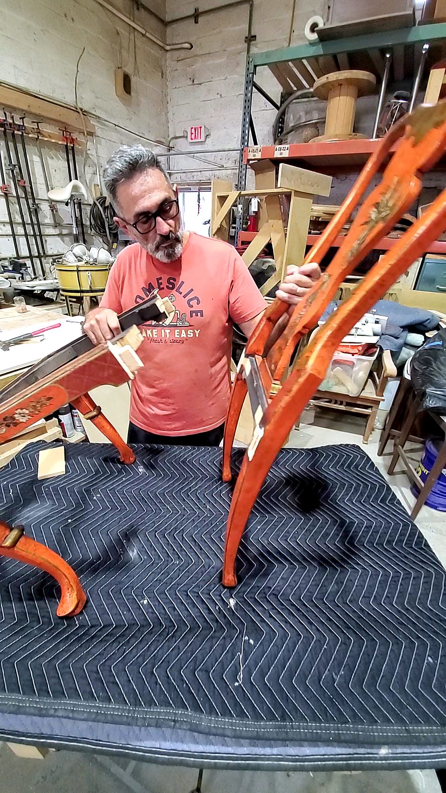 Gabriel restoring a chinoiserie chair